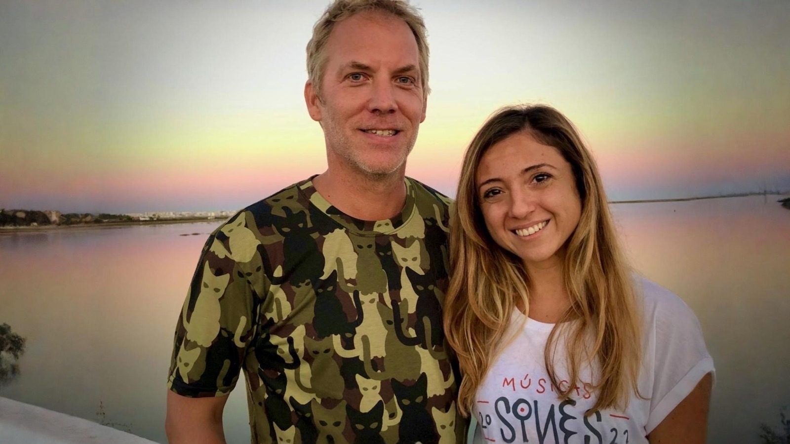 Lucia and James at sunset on the beach